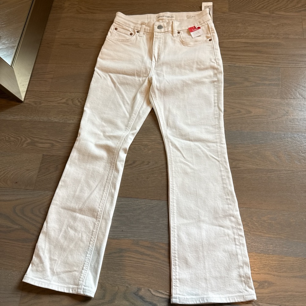 White denim forum bootcut jeans